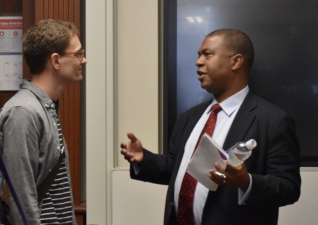 Spencer Boyer speaks with student